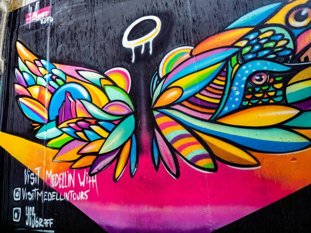 Graffiti street art angel wings Medellín Colombia